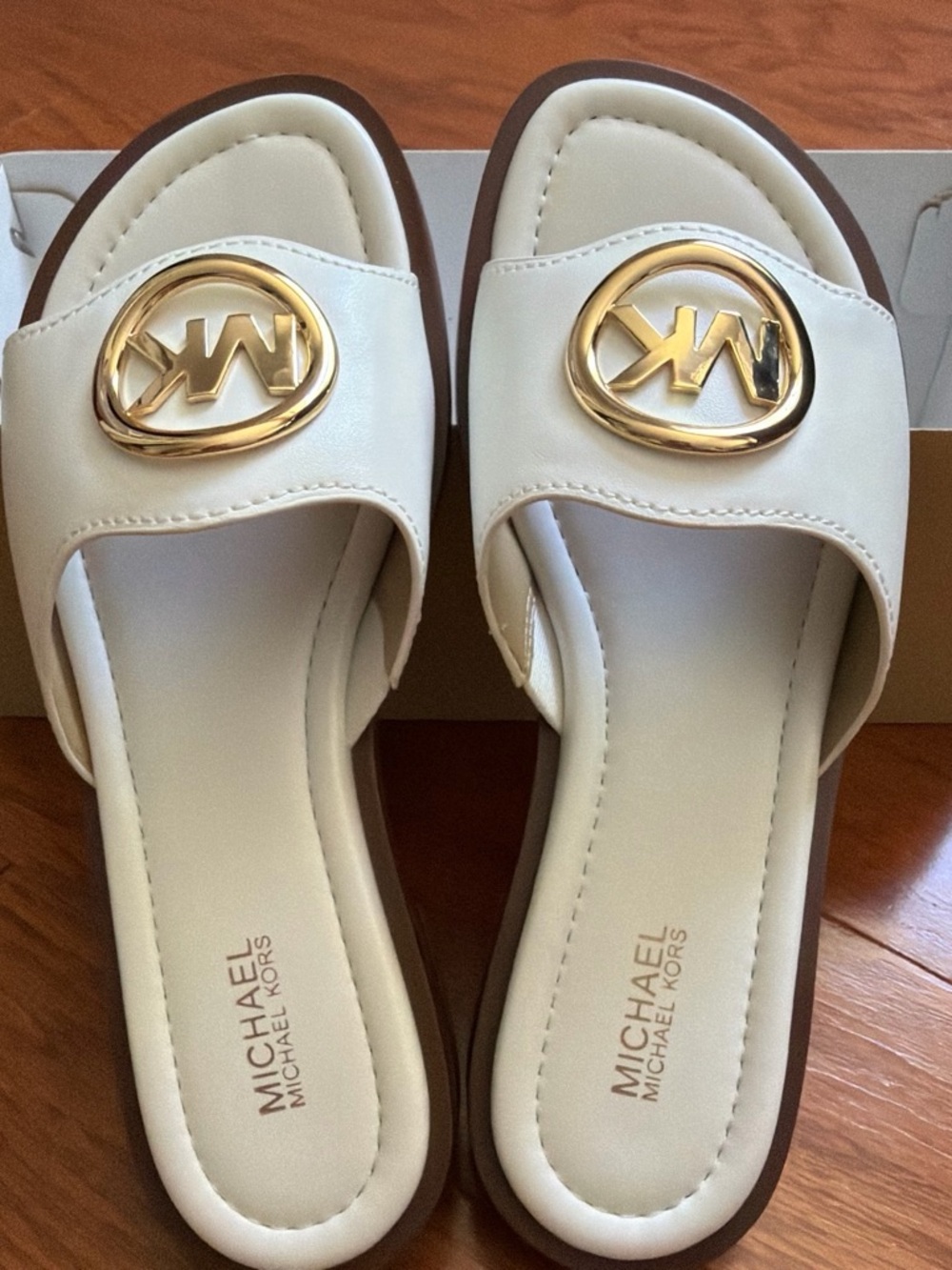 Michael Kors Cream Slide Sandals with Gold MK Medallion